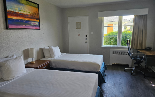 Spacious family suite with retro design at 2400 Motel Kingsway