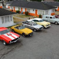 Lineup of classic vintage cars at 2400 Motel car show